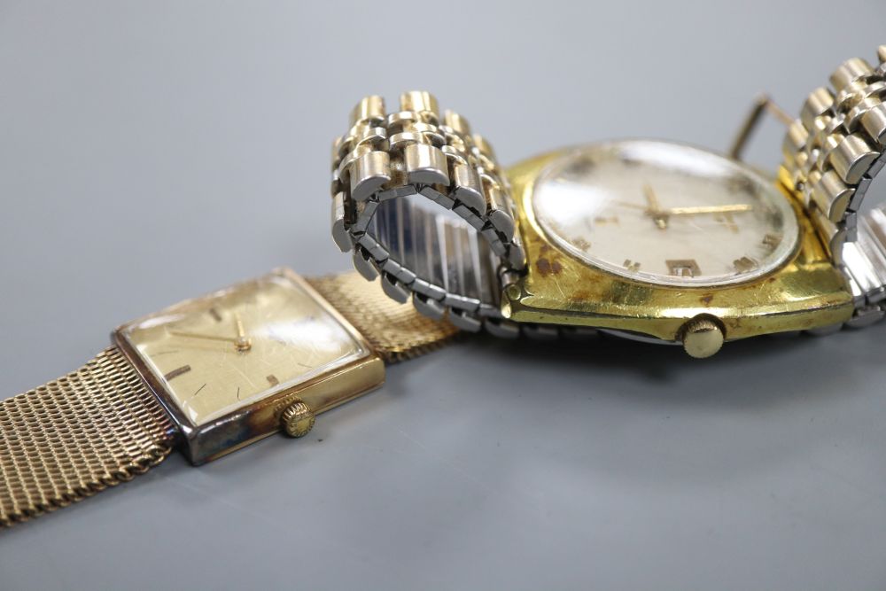 A 9ct gold Longines manual wind square dial wrist watch, on a 9ct Longines bracelet(a.f.) and one other Longines watch.